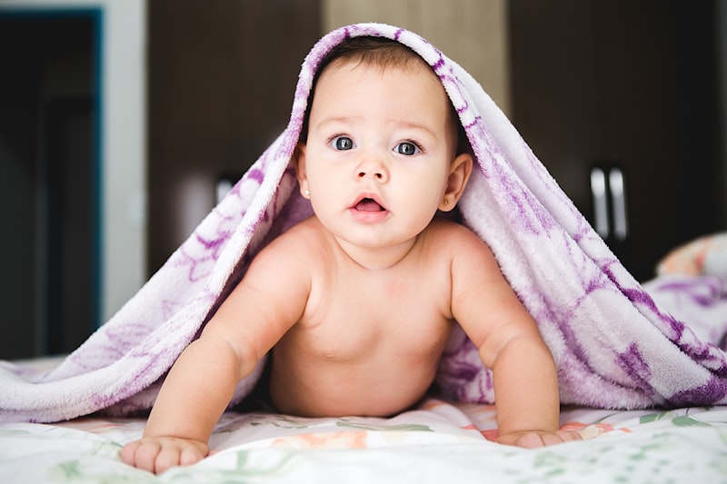 Happy baby in our infant care