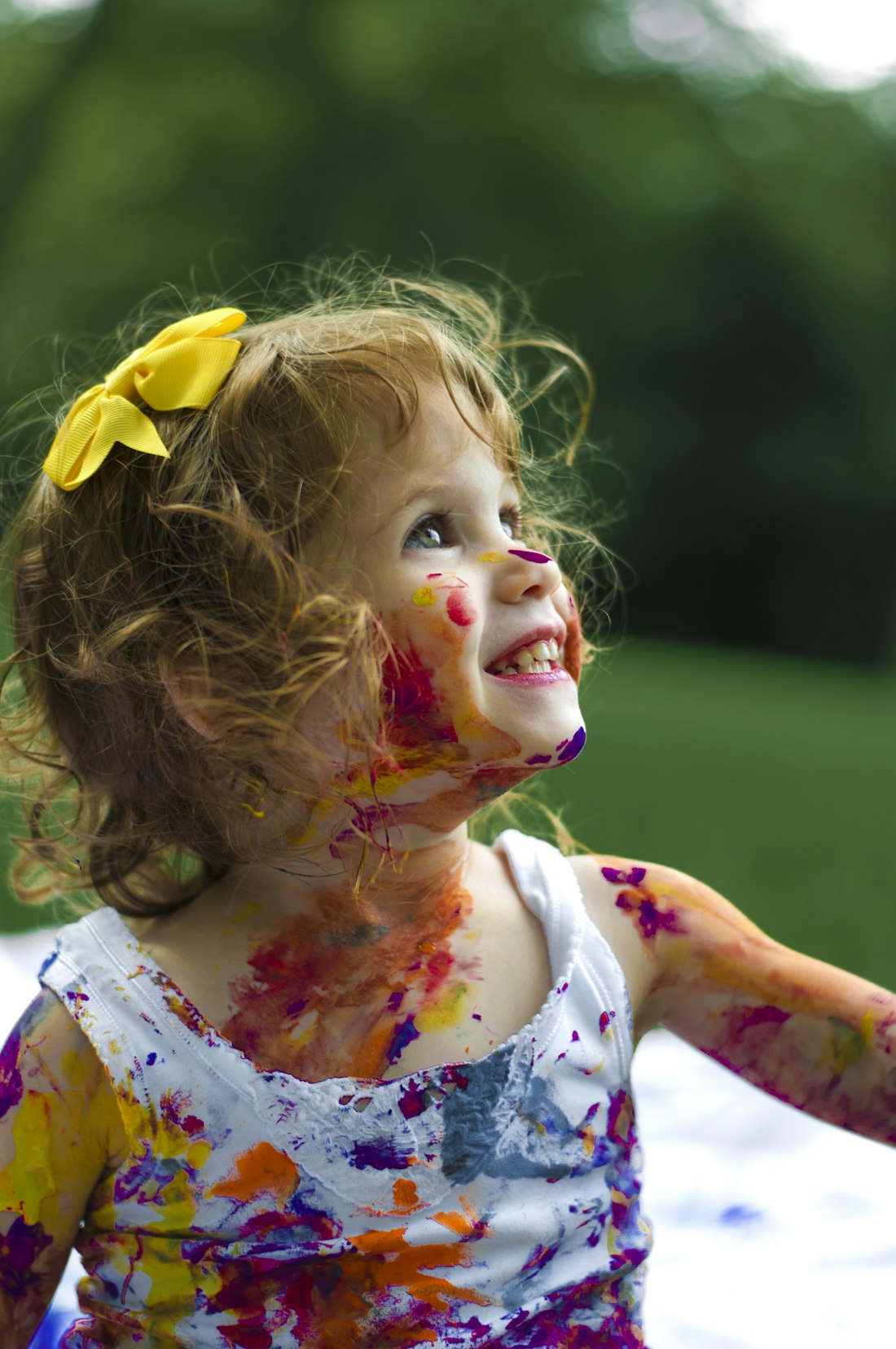 Child happily exploring hands-on learning materials